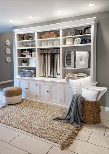 boll and branch store with rug and shelving unit